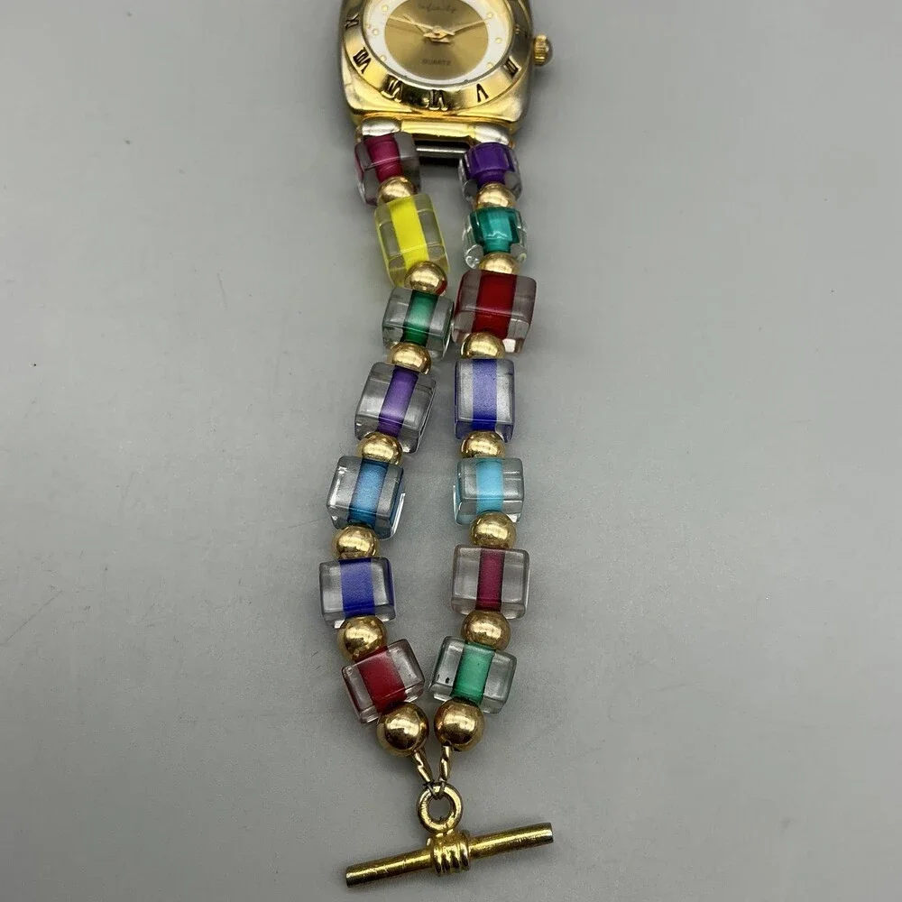 Infinity Womens Watch 24mm Gold Tone Multicolor Bead Bracelet New Battery 6.75